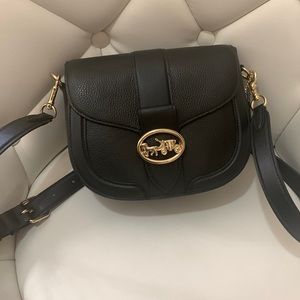 Gently used Coach Georgie Saddle Bag